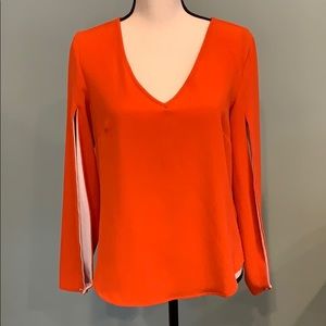 Orange Blouse With Open Sleeve Detail